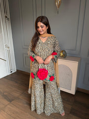 Beautiful leopard print with 3D flower embroidery paired with kaildaar sharara and net dupatta (Karina)