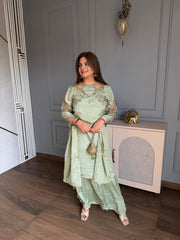 Beautiful hand embroidered sharara chinnon suit