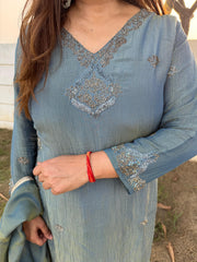 Pure crushed tissue suit with full lining and hand work detailing all over the shirt and tissue dupatta (Nishi)
