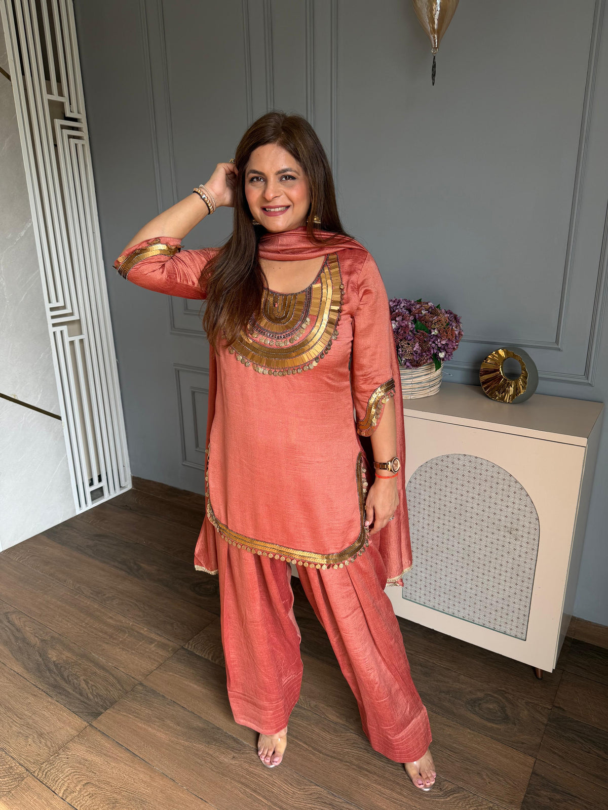 Beautiful hand embroidered suit with beautiful detailing on neck sleeves and ghera (Tanisha)