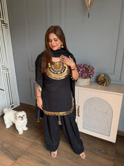 Beautiful hand embroidered suit with beautiful detailing on neck sleeves and ghera (Tanisha)