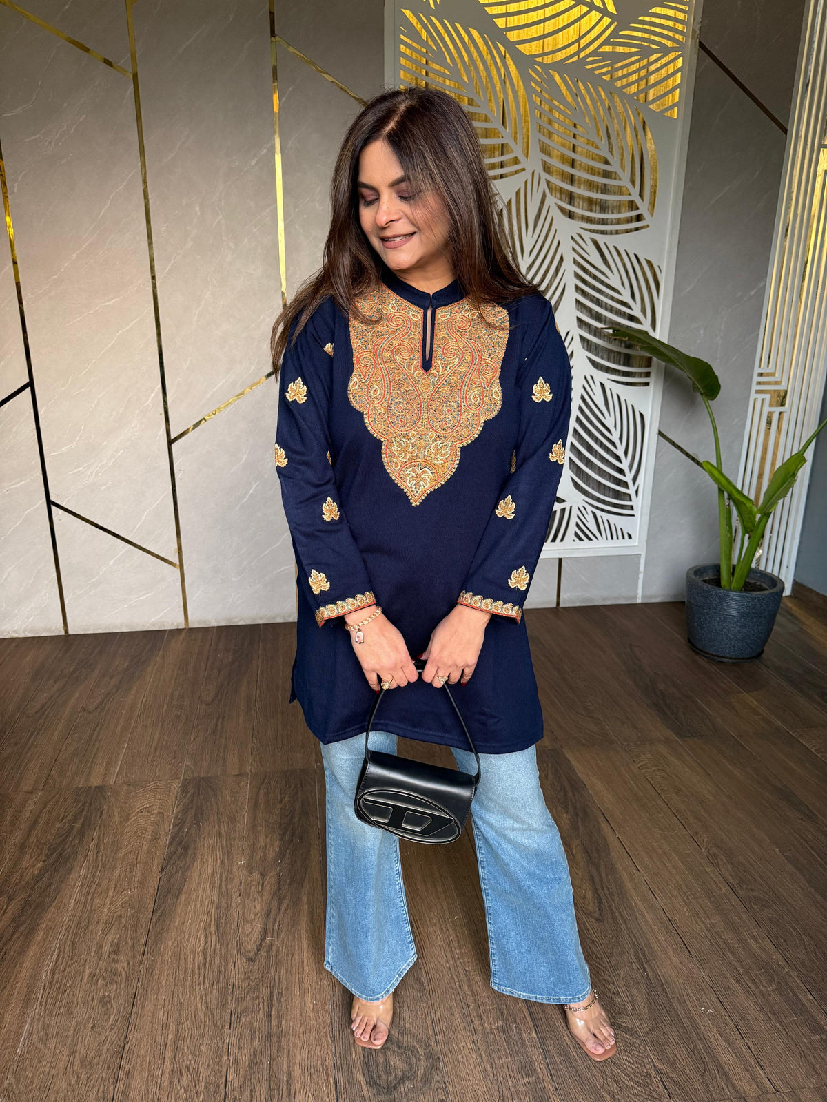 All new woollen emnbroidered stylish kurtis (Bhumi)